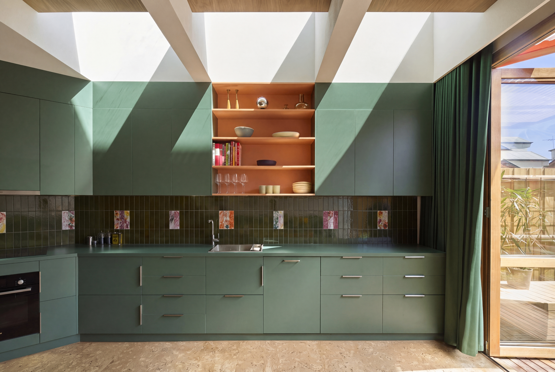 Forest Green L-Shape Kitchen — cabinet carcases, doors removed